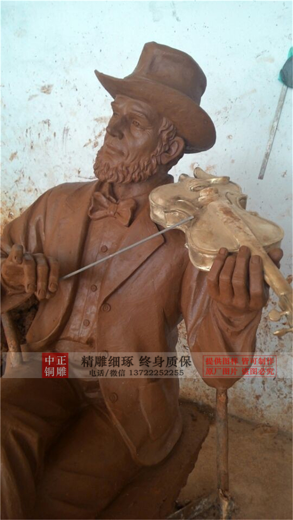 園林拉小提琴雕塑.jpg 園林拉小提琴雕塑.jpg